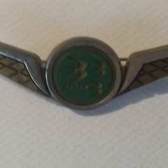 Stoffel Seals Signed Wing Brooch Pin Gold Tone Green Round Bezel Center