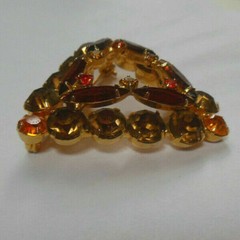 Triangular Shape Brooch with multi color faceted prong-set stones
