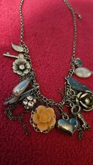 Cute 18 inch Necklace with various charms as shown