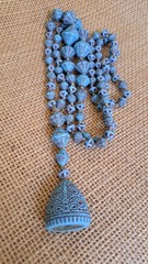 Neiger Brothers deco glass turquoise blue spiderweb flapper necklace with fob