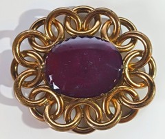 Large Vintage Brooch: Mottled Red-Purple Glass Stone in Interlocked Brass Rings