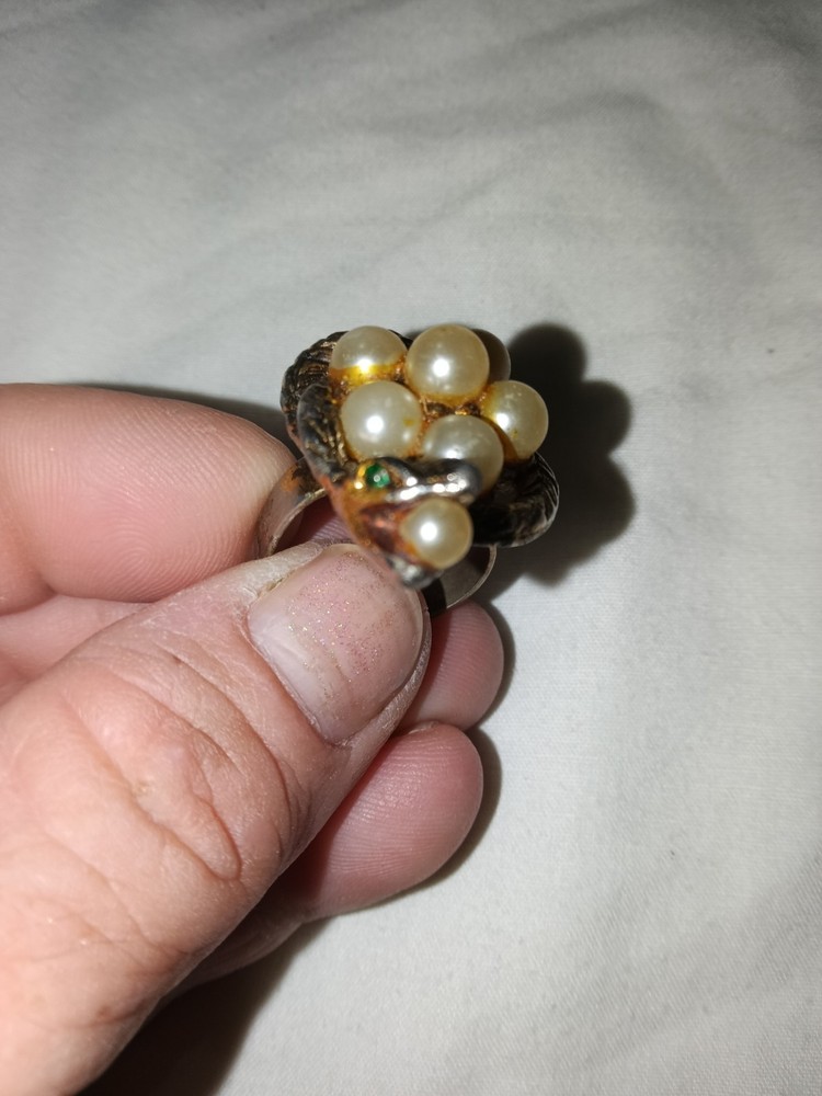 vintage snake ring with cultured pearls and small green emerald eyes.