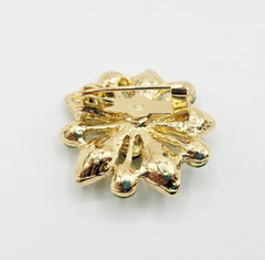 Gold Tone Rhinestone Green Ornate Costume Jewelry Floral Snowflake Brooch Pin