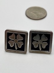 Vintage Anson Silver Tone Four Leaf Clover Relief Black Background Cufflinks
