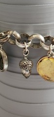 Vintage Avon Multiple Charm Silvertone Stretchable Locket Bracelet 8+
