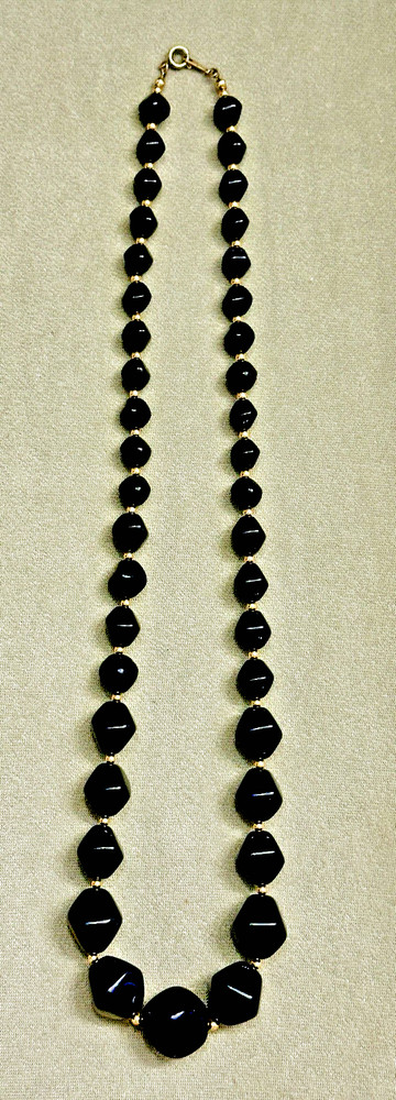 Vintage Avon “Modern Art” chunky black bead necklace with gold-tone spacers