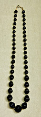 Vintage Avon “Modern Art” chunky black bead necklace with gold-tone spacers