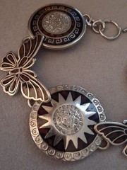 Mexican alpaca silvertone butterfly & Aztec sun medallion bracelet. 7″