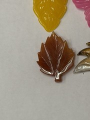 Lot Of 4 Vintage-style translucent plastic leaf and butterfly pendants/jewelry