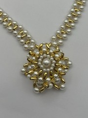 Vintage Necklace Of Gold-tone Beads With Faux Pearls And A Snowflake Pendant