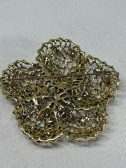 Vintage gold-tone Filigree Brooch Pin Green Rhinestones – 2.25″ diameter