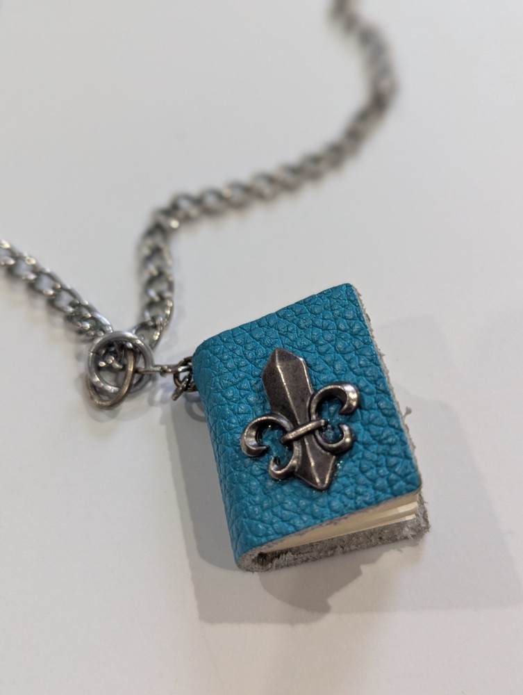 Vintage handcrafted blue leather miniature book necklace and fleur-de-lis Charm