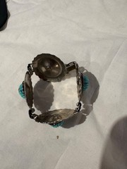Vintage Southwestern Style Bracelet Silver Tone Metal with Carved Turquoise-Colo