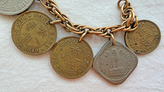 VINTAGE COIN CHARM BRACELET 11 INT COINS