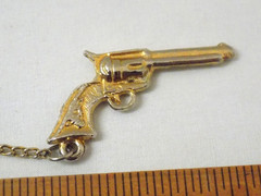 Vintage 1940s 1 3/4 Inch Gold Tone Six Shooter Charm On Two Inch Chain