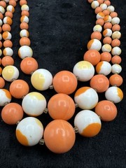 Vintage Multi Strand Orange White Swirl Beaded Necklace Made In Japan Glows