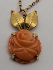 Krementz Carved Coral Rose Flower With Gold Tone Leaves Pendant On 17.75″ Chain.