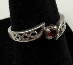 Vintage Ladies Sterling Silver Ring with a Red Garnet and Celtic Knot Design