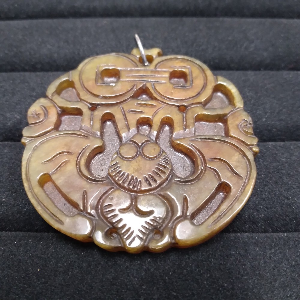 Brown Stone Carved Pendant Silver Tone