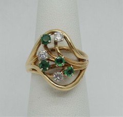 Vintage Solid Gold Ring with a Spray of Emeralds and Diamonds
