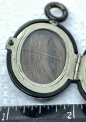 A Vintage Hinged 2 Sided Hair Mourning Pendant. Black Enameled Good Condition