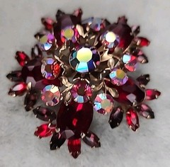 Vintage gold-toned Brooch featuring Ruby Red Navette and round Aurora Borealis