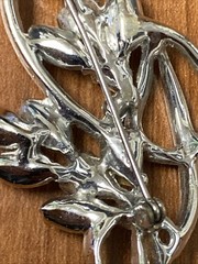 vintage rhinestone floral spray brooch, similar to designs from the 1940s-1950s