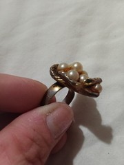 vintage snake ring with cultured pearls and small green emerald eyes.