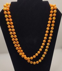 Vintage Double Strand Orange and Cream Beaded Necklace 22″ unsigned