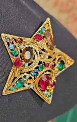 La Roco 1950s Star Brooch Colorful Gold Tone Rhinestones Textured Gold Plate