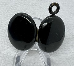 A Vintage Hinged 2 Sided Hair Mourning Pendant. Black Enameled Good Condition