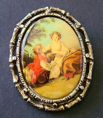 Vintage Porcelain Gold Tone Convex Framed Courting Couple Oval Pin Brooch 2 Inch