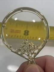 Vintage Magnifier Pendant Necklace. Gold tone. Made in USA in 1960’s. Hangs 15”