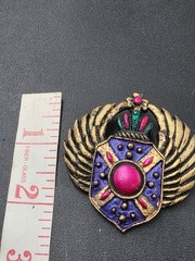Vintage 1980s Egyptian Revival Winged Shield Brooch – Bold Purple Pink Enamel