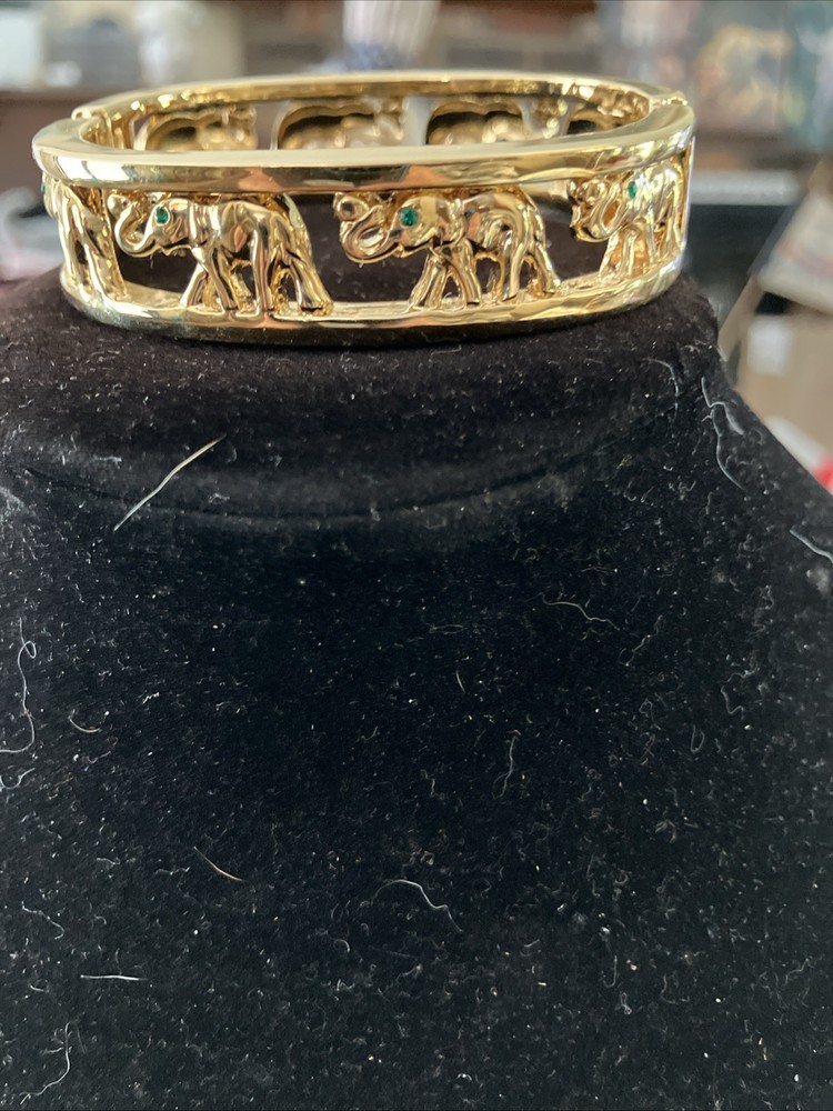 gold tone elephant hinged bracelet Trunks Up Green Eyes Unsigned