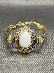 Elegant vintage style gold bracelet with white oval stone women’s jewelry