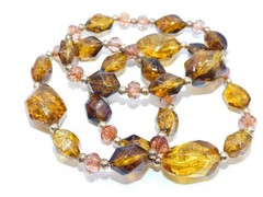 J175-LOT OF 4 STRETCH BRACELETS~AMBER/GOLD TONE BEADS~HARD PLASTIC~