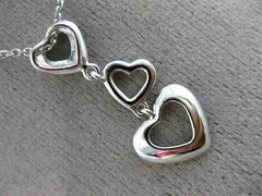 ESTATE .06CT DIAMOND 14KT WHITE GOLD 3D OPEN TRIPLE HEART FLOATING LOVE PENDANT