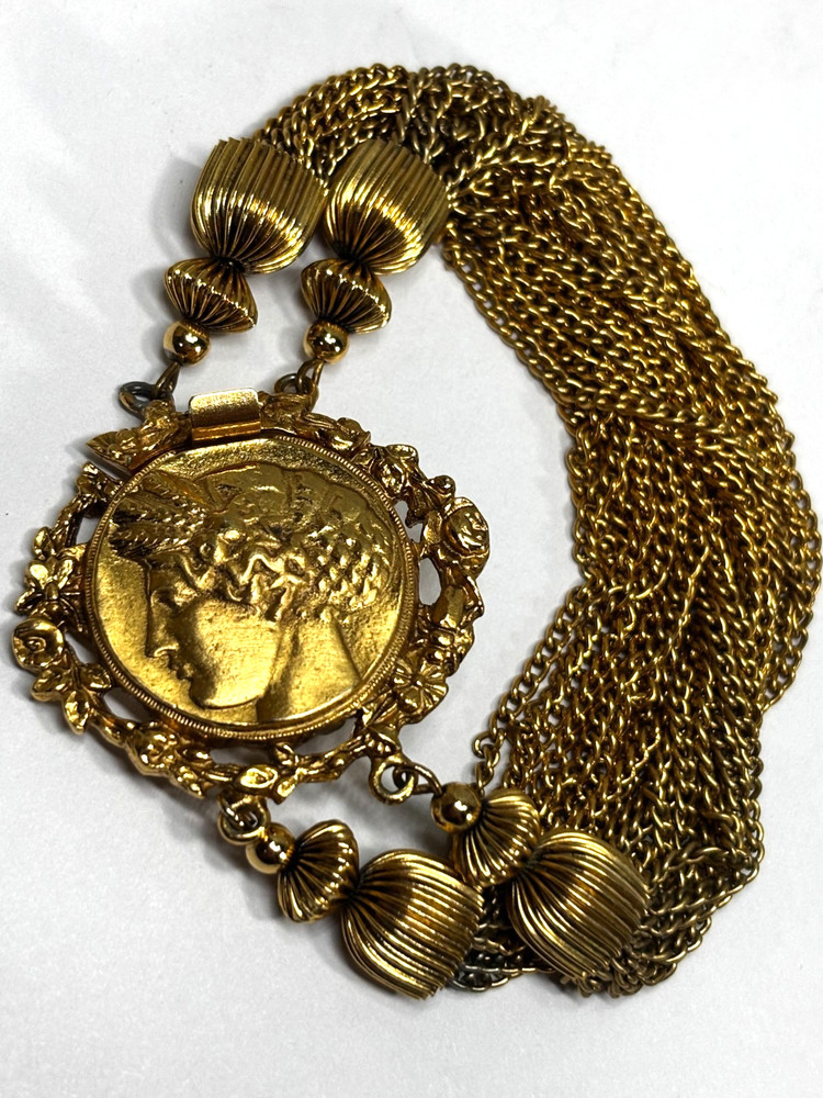 Vintage Ornate Gold-tone Coin attached to 24 dangling tassel Chains Bracelet