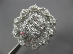 EXTRA LARGE 3.51CT DIAMOND 18KT WHITE GOLD ROUND & BAGUETTE FLOWER INFINITY RING