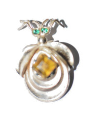 Unique unsigned art deco figural green eyed rhinestone bug fur clip brooch