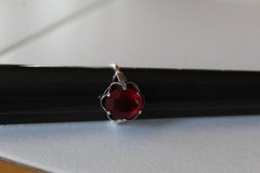 MARKED STERLING SARAH COV SIZE 8.5 RING WITH PRONG SET RED STONE