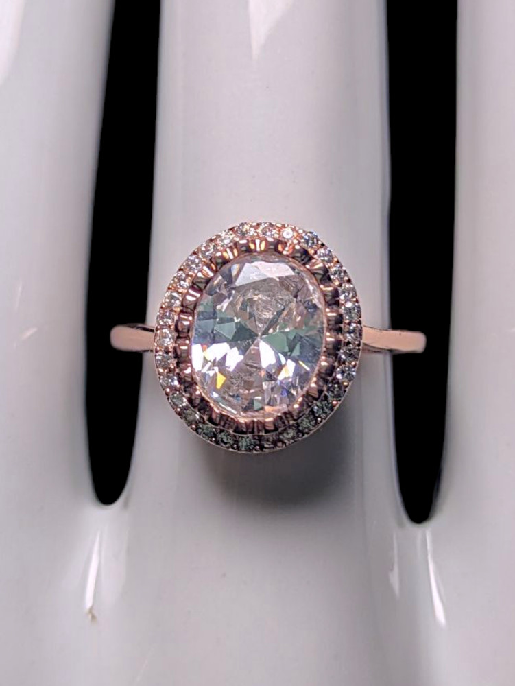 Vintage Inspired Simulated Diamond Solitaire with Simulated Diamond Halo with As