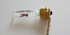 VTG COPAREL ME COLOGNE IN A FLACON PENDENT NECKLACE 29″ CHAIN BLUE STONE ON TOP
