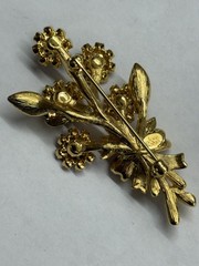 vintage signed joan rivers spinning flowers swarovski crystal brooch