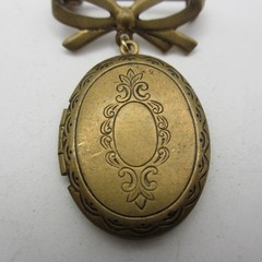 Vintage Bow Locket Brooch Oval Etched Gold Tone