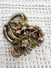 Vintage 40’s Pot Metal Cast Rhinestone Swirl Pink Brooch 1.5”