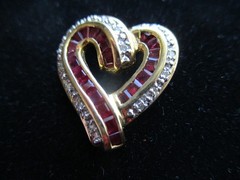 14K Solid Gold, (16) Diamonds & (22) Ruby’s. Heart Pendant.