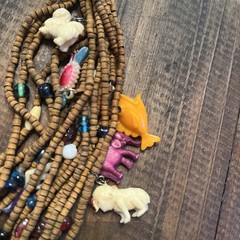 Vintage one of a kind wood bead Necklace w/ tons of celluloid charms unique cool