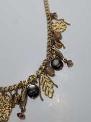 ✨VINTAGE✨ 16″ Ornate Gold Tone Dangling Necklace w/ Charms, Stones & Beads